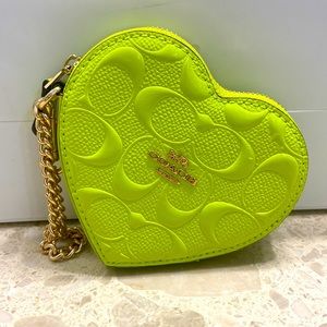 Coach heart shaped wristlet purse.
